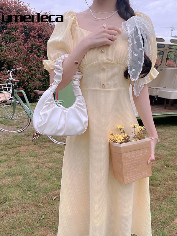 优慕莱咔女装2022春夏季黄色泡泡袖连衣裙