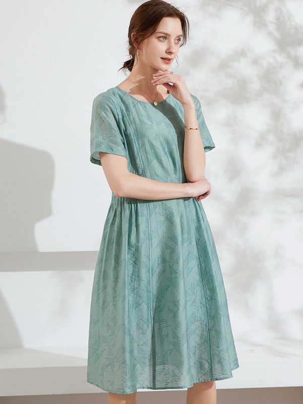 乔妮塔女装2022春夏季绿色纯色连衣裙