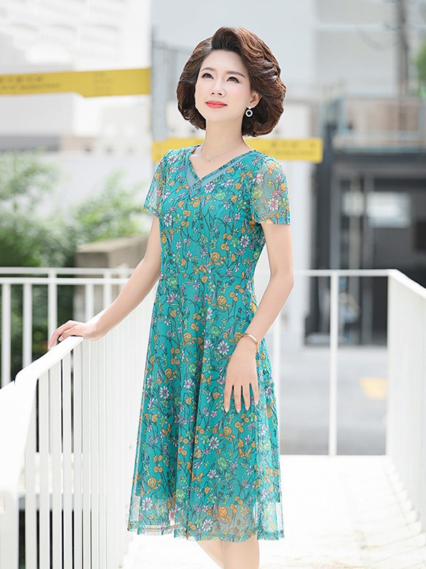 简狐2023春夏季绿色连衣裙